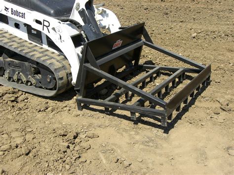 skid.com steer with grading rake|landscape attachments for skid steer.